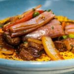 lomo saltado with quinoa risotto