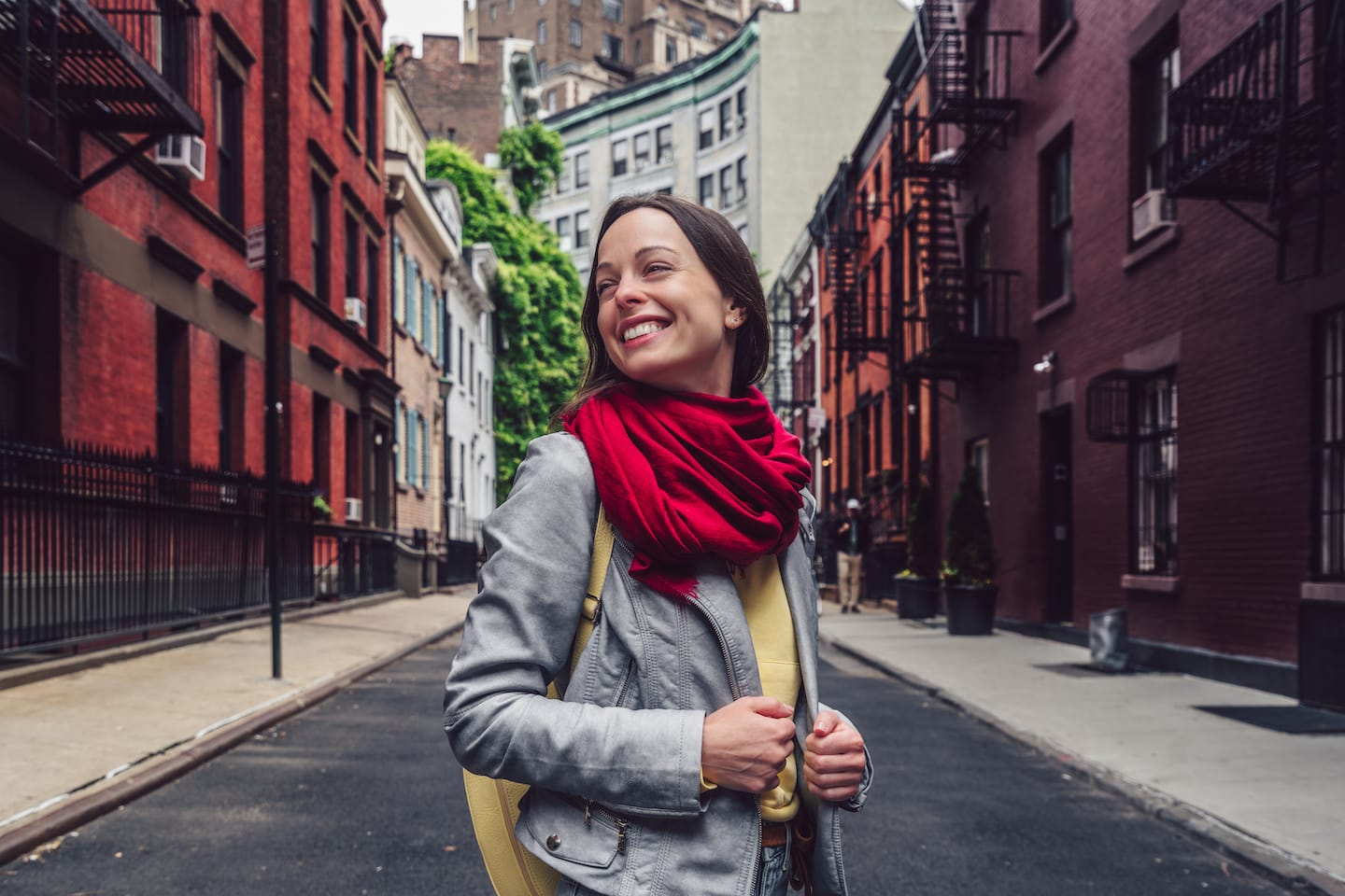 smiling-girl-on-a-famous-street-GFLMX4Z