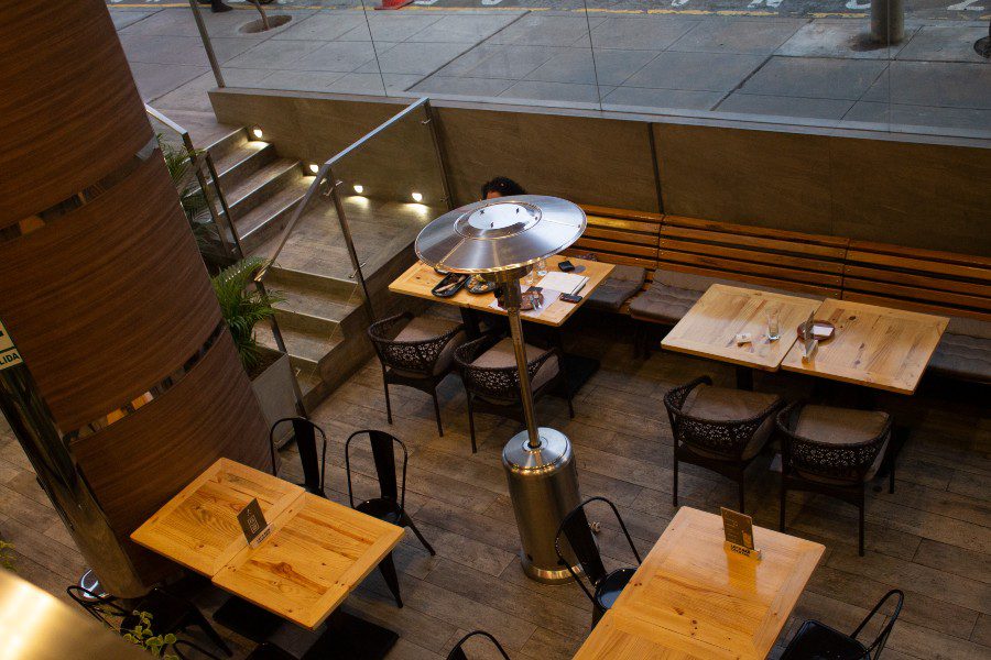 patio dining area at fuego smokehouse in miraflores