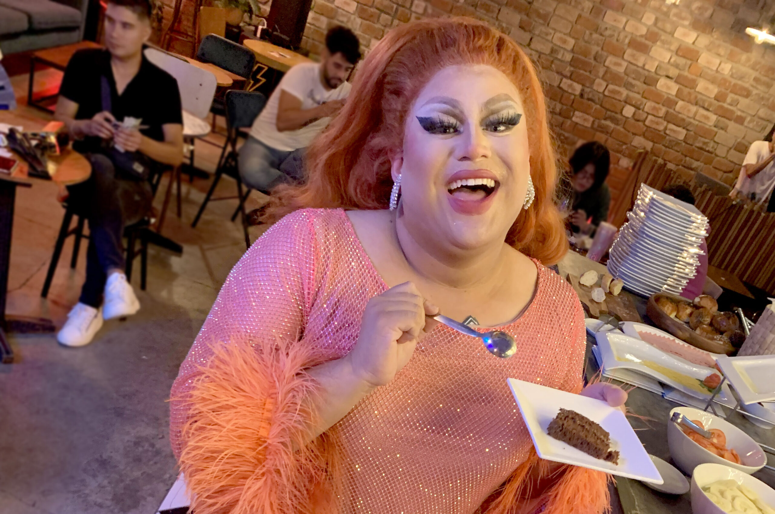 Drag Queen Serving Drag Entertainer La Langosta serves breakfast