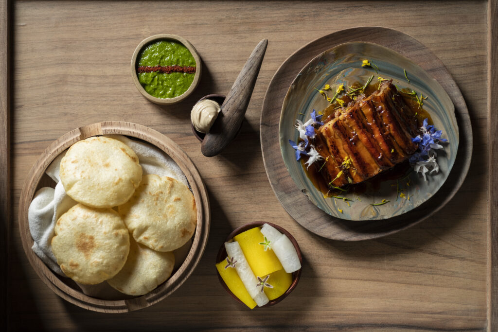 Arepas and placed pork Belly